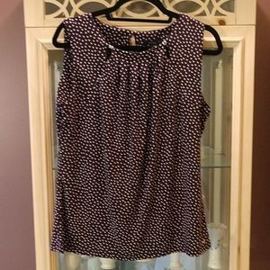Tommy Hilfiger large sleeveless blouse.